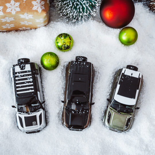 Land Rover Defender models in the snow – Christmas campaign for Auto Stopka
