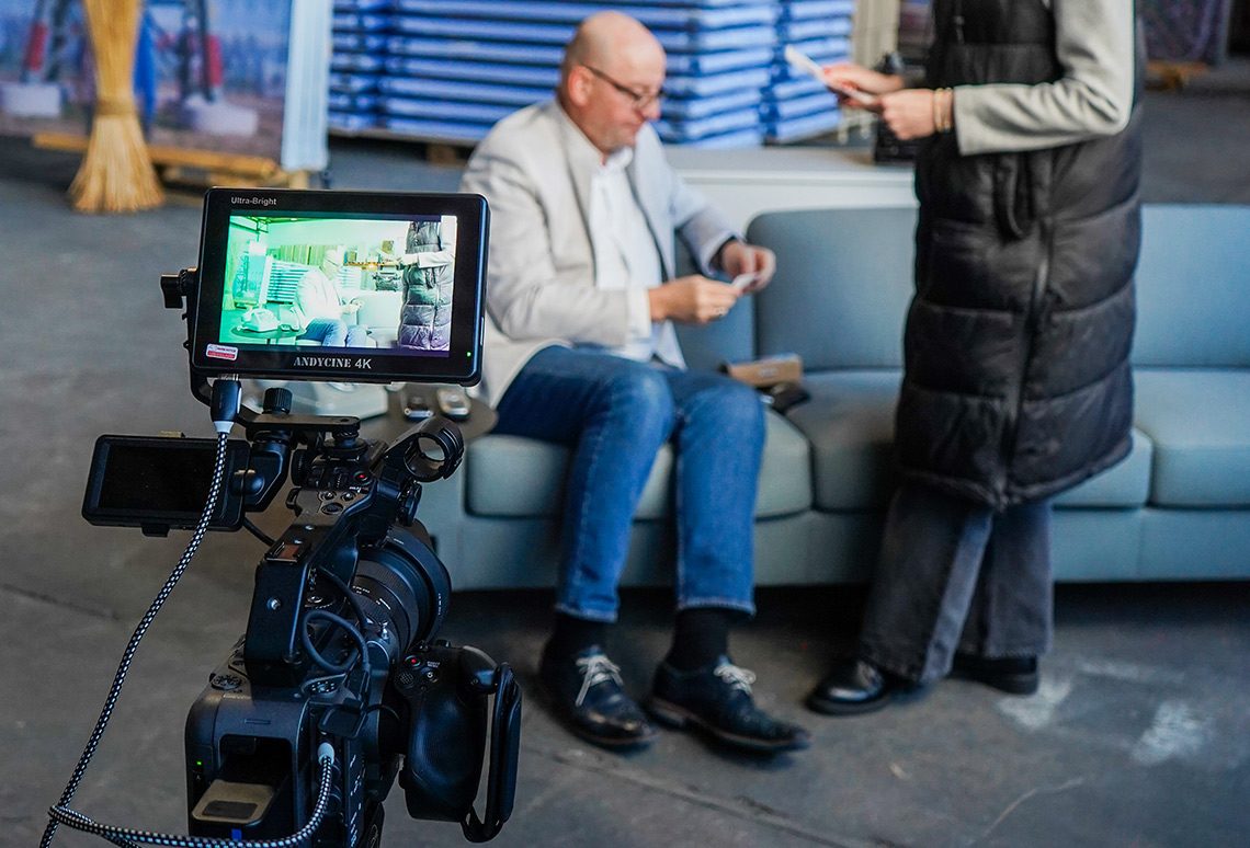 Behind the scenes of a JERICHO Media interview shoot with camera and monitor
